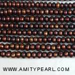 3189 center drilled pearl 5-6mm dark red.jpg